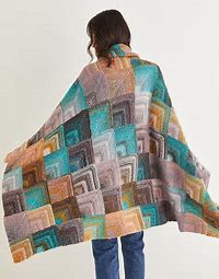 Sirdar 10142 Knitted Domino Blanket in Sirdar Jewelspun Aran (#4 weight yarn).
